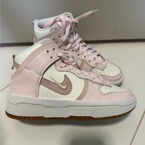 Pink women’s Nike dunk high up